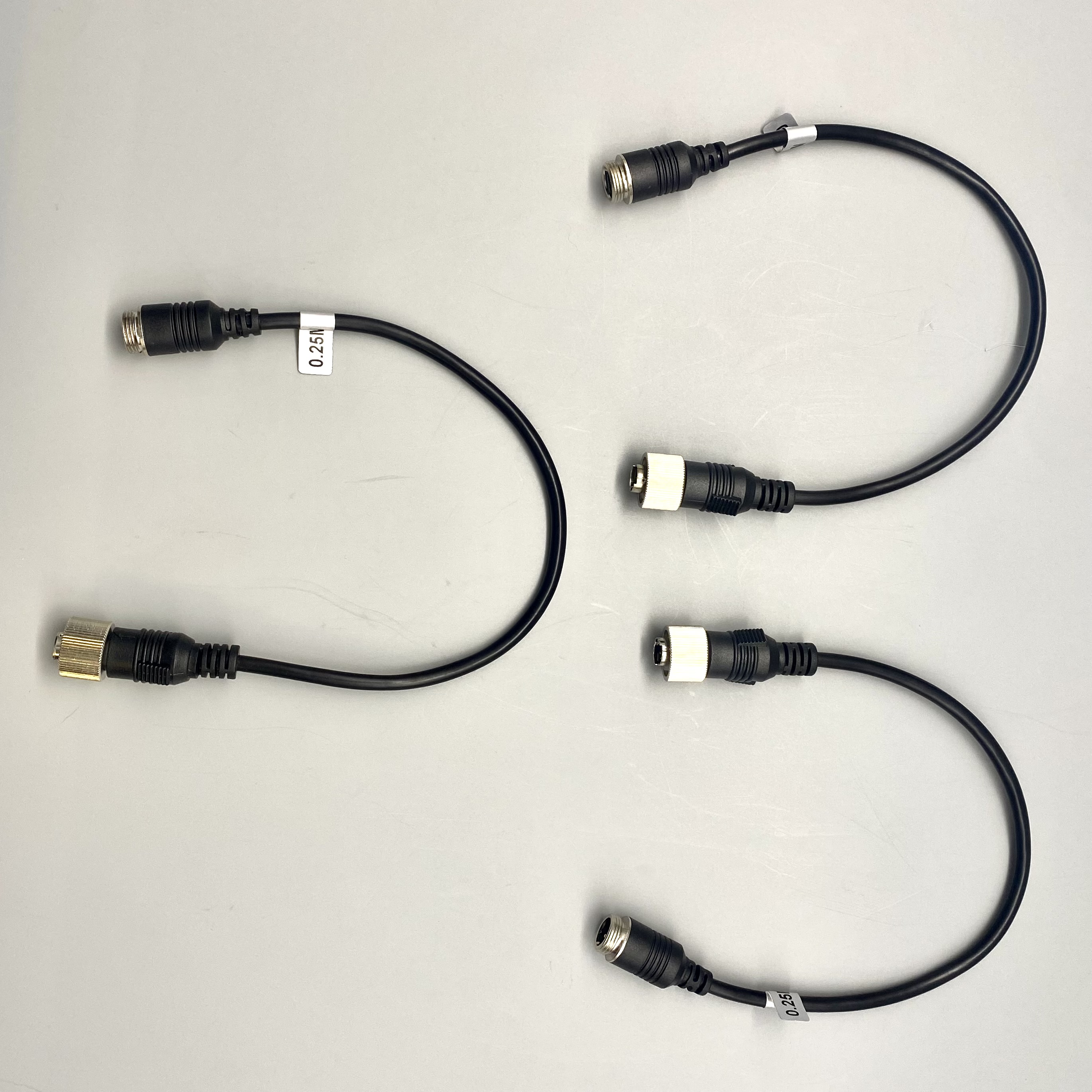 Adapter: Allows Zone Defense camera to connect to locking 4-pin mini-din cable